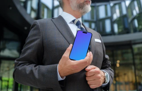 Businessman holding a phone