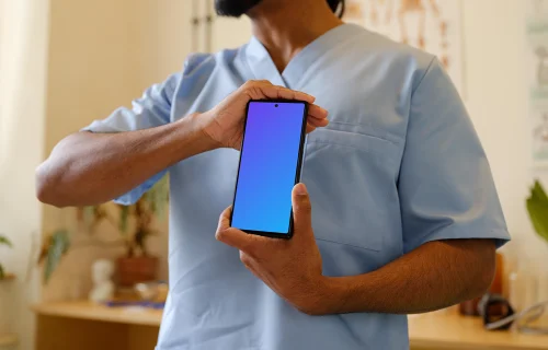 Médico do sexo masculino segurando um Google Pixel mockup