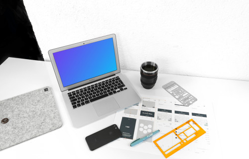 Macbook Air mockup on working desk