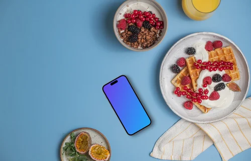 Smartphone mockup com pratos de café da manhã